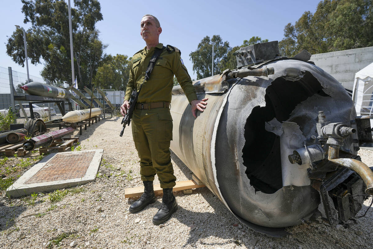 Israeli military spokesperson, Rear Adm. Daniel Hagari, displays to the media one of the Irania ...