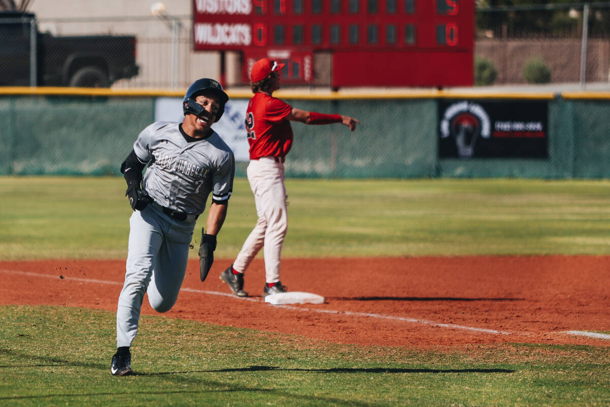 Faith Lutheran infielder Rouselle Shepard (7) runs to home base during a baseball game between ...