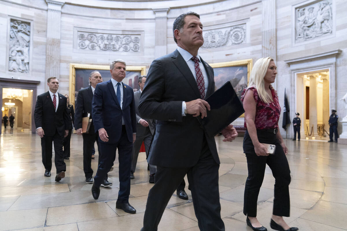 House Impeachment Managers from left, Rep. Michael Guest, R-Miss., Rep. Andy Biggs, R-Ariz., Ho ...