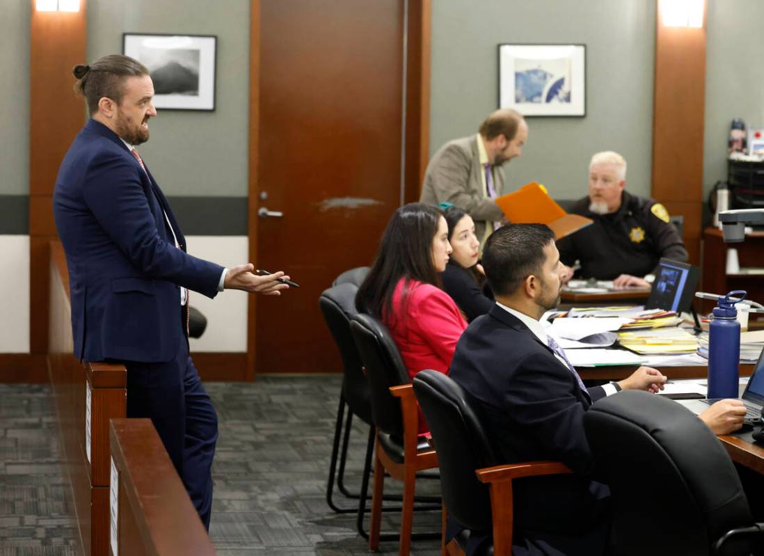 Chief Deputy District Attorney Jay Raman, right seated, listens as Attorney Robert Jennings Sch ...