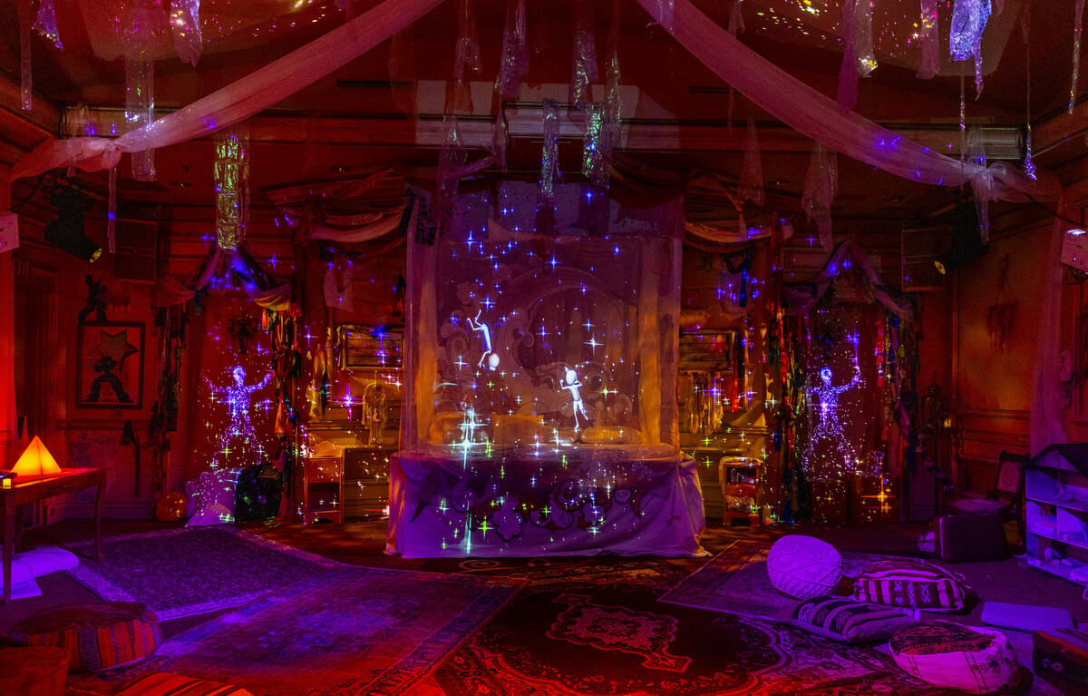 Animated characters dance about the space in a bedroom scene at Particle Ink, a new immersive a ...