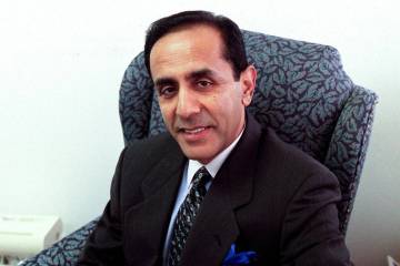 Dr. Ikram U. Khan sits for a photo in his Las Vegas office Wednesday, July 24, 2002. (Christine ...