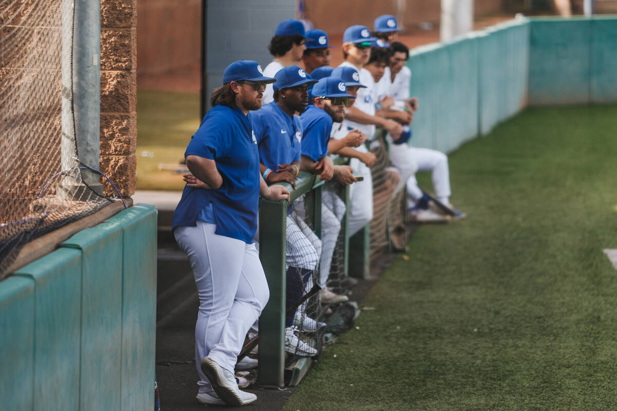 Bishop Gorman interim head coach Jeff Malm watches game action during an baseball game between ...