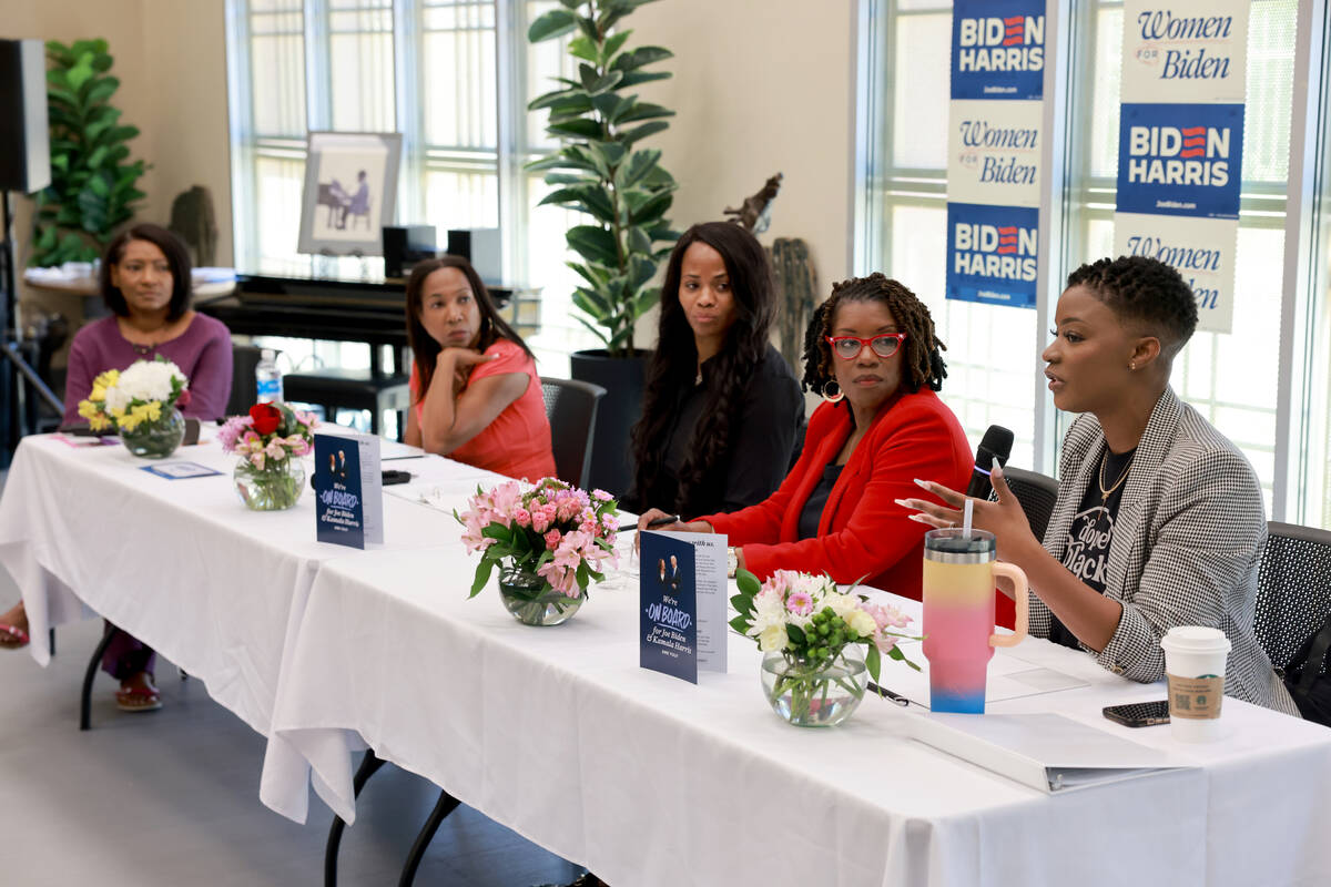 Tiara Flynn, right, a doula and founder/owner of Phenomenal Mama, speaks during a Biden-Harris ...
