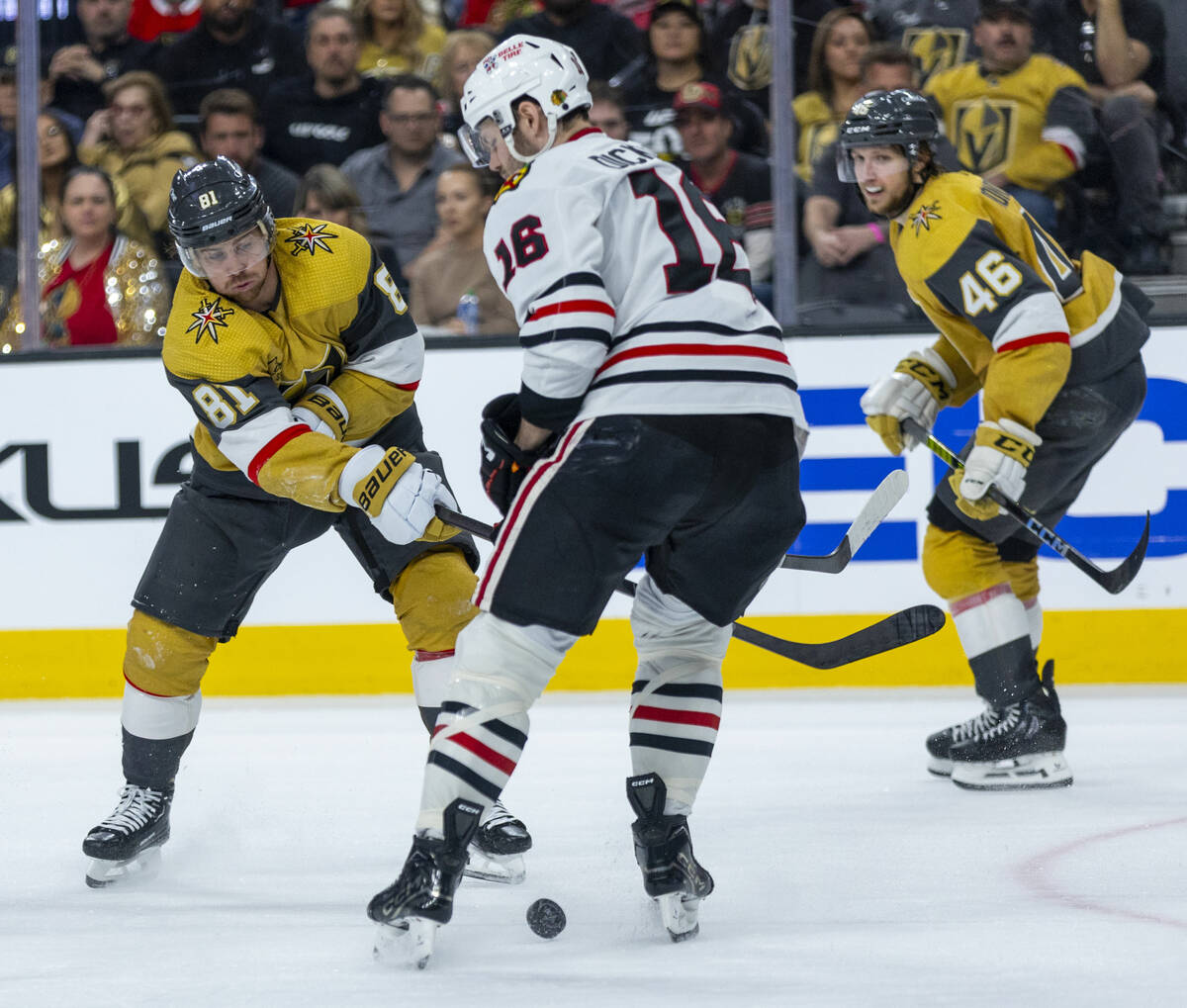 Golden Knights right wing Jonathan Marchessault (81) sends a shot between the skates of Chicago ...