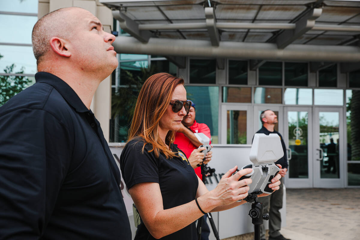 Mary Movius, a civilian drone operator, operates a drone for a media demonstration next to Dete ...