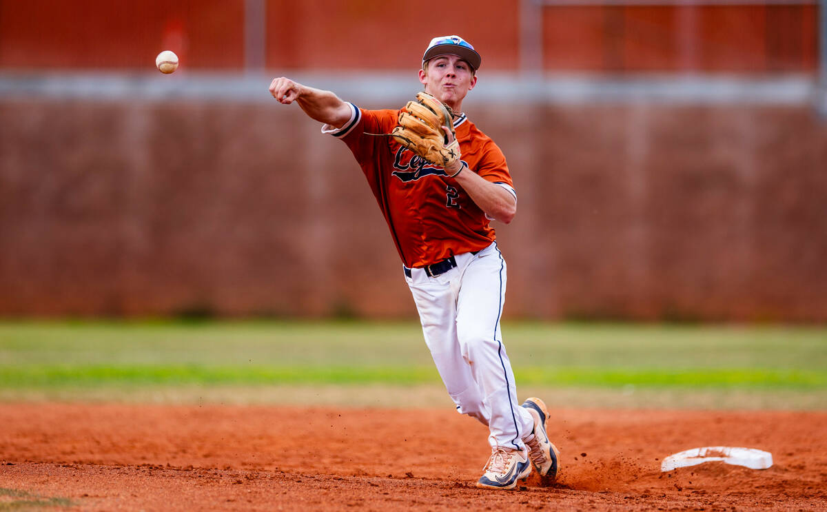 Legacy infielder Kyler Avila (2) makes a throw to stop a Sierra Vista runner during the third i ...