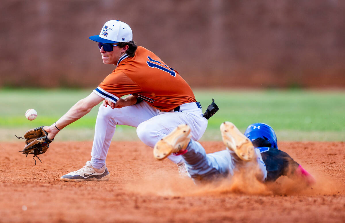 Sierra Vista runner Jayson Schmeisser arrives to second base safely ahead of a throw to Legacy ...