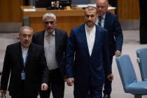 Iran's Minister for Foreign Affairs Hossein Amir-Abdollahian, right, and Iran's Ambassador to t ...