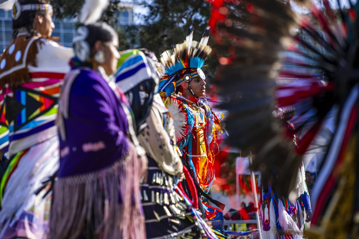 Dancers move about the grounds while performing for the crowd during the Powwow for the Planet ...