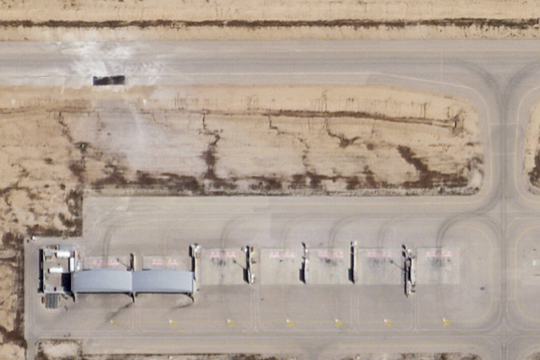 This satellite photo taken by Planet Labs PBC shows a repaired taxiway after Iranian attack on ...