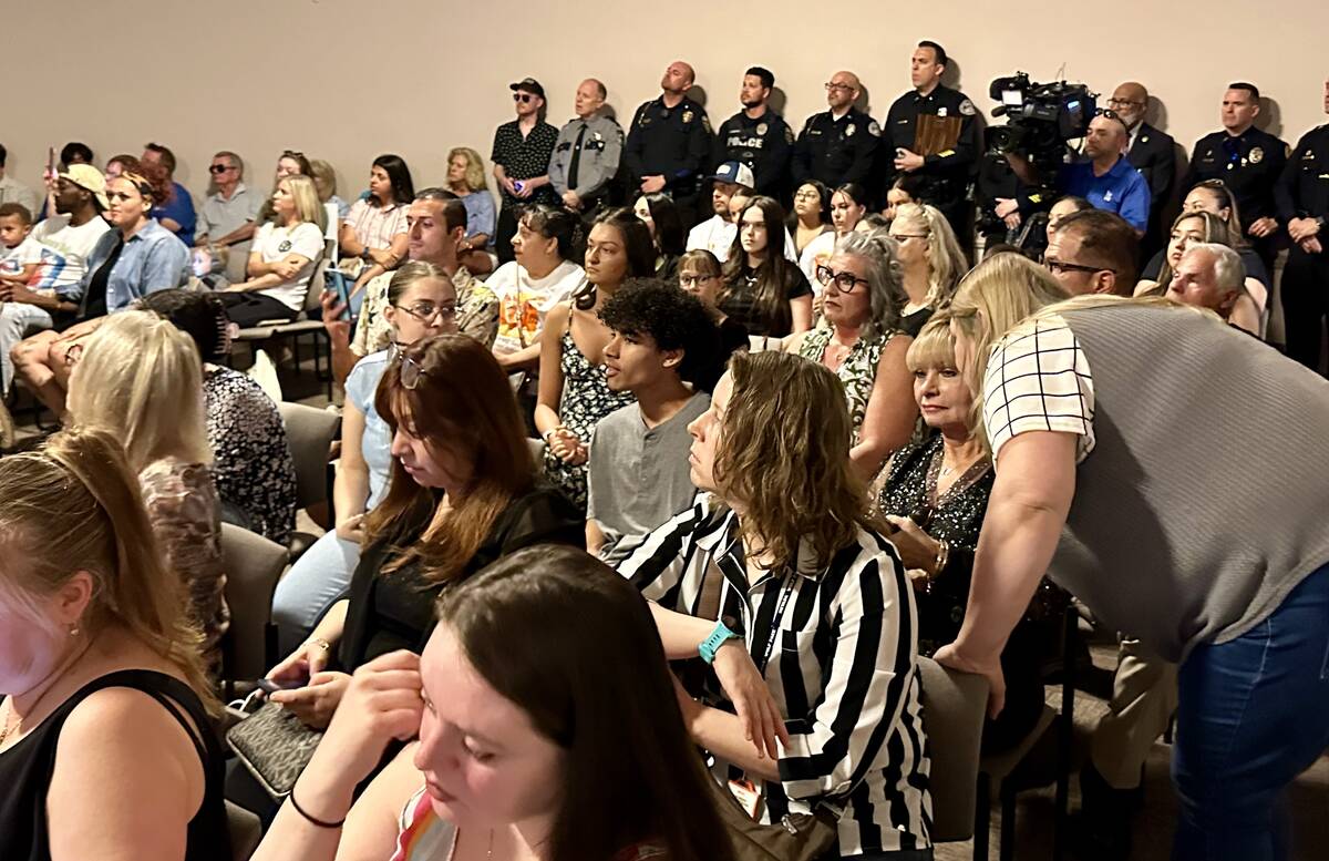 Audience members and police officers watch the Stop DUI advocacy group’s Heroes and Handcuffs ...