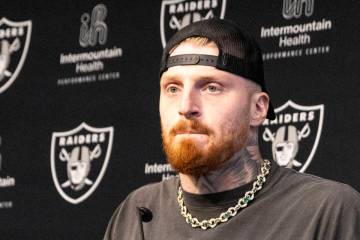 Raiders defensive end Maxx Crosby takes questions during a media availability on the first day ...