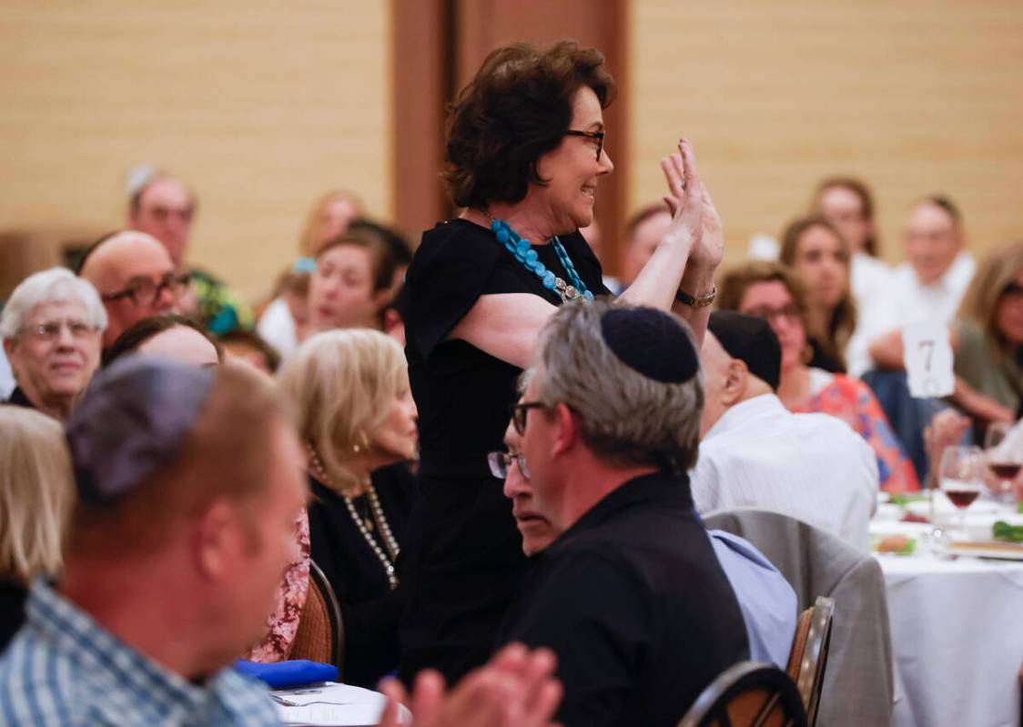 Sen. Jacky Rosen, D-Nev., acknowledges the crowd during a Passover Seder meal at Congregation N ...