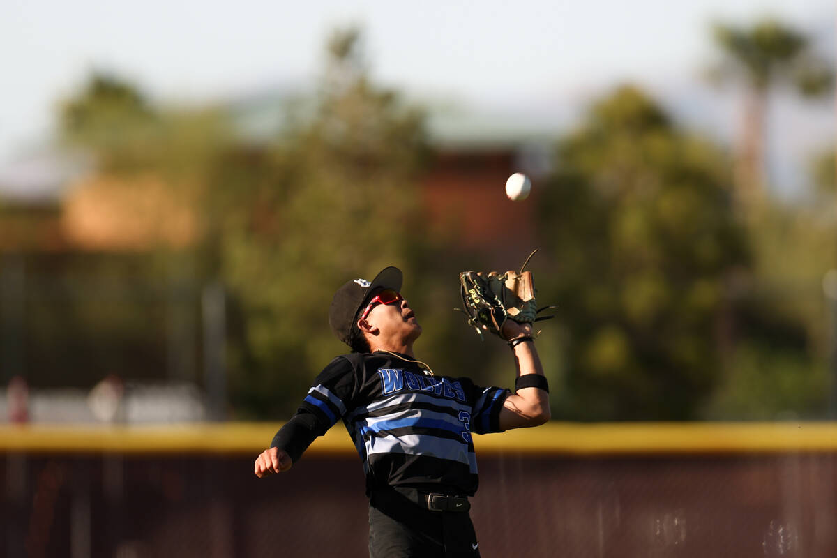 Basic shortstop Ty Southisene (3) catches the ball for an out during a high school baseball gam ...