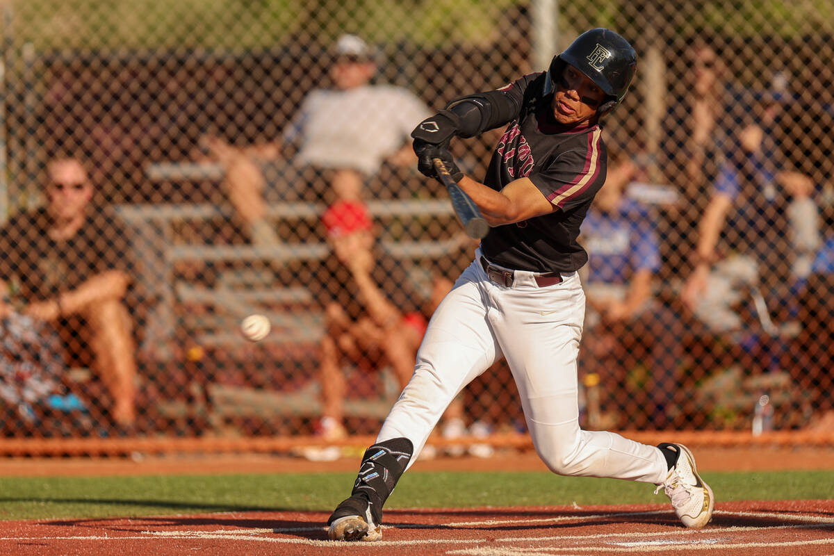 Faith Lutheran infielder Rouselle Shepard (7) bats against Basic during a high school baseball ...