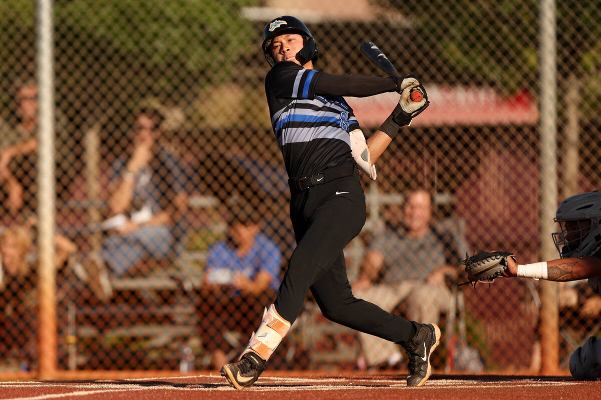 Basic second baseman Tate Southisene (8) bats against Faith Lutheran during a high school baseb ...