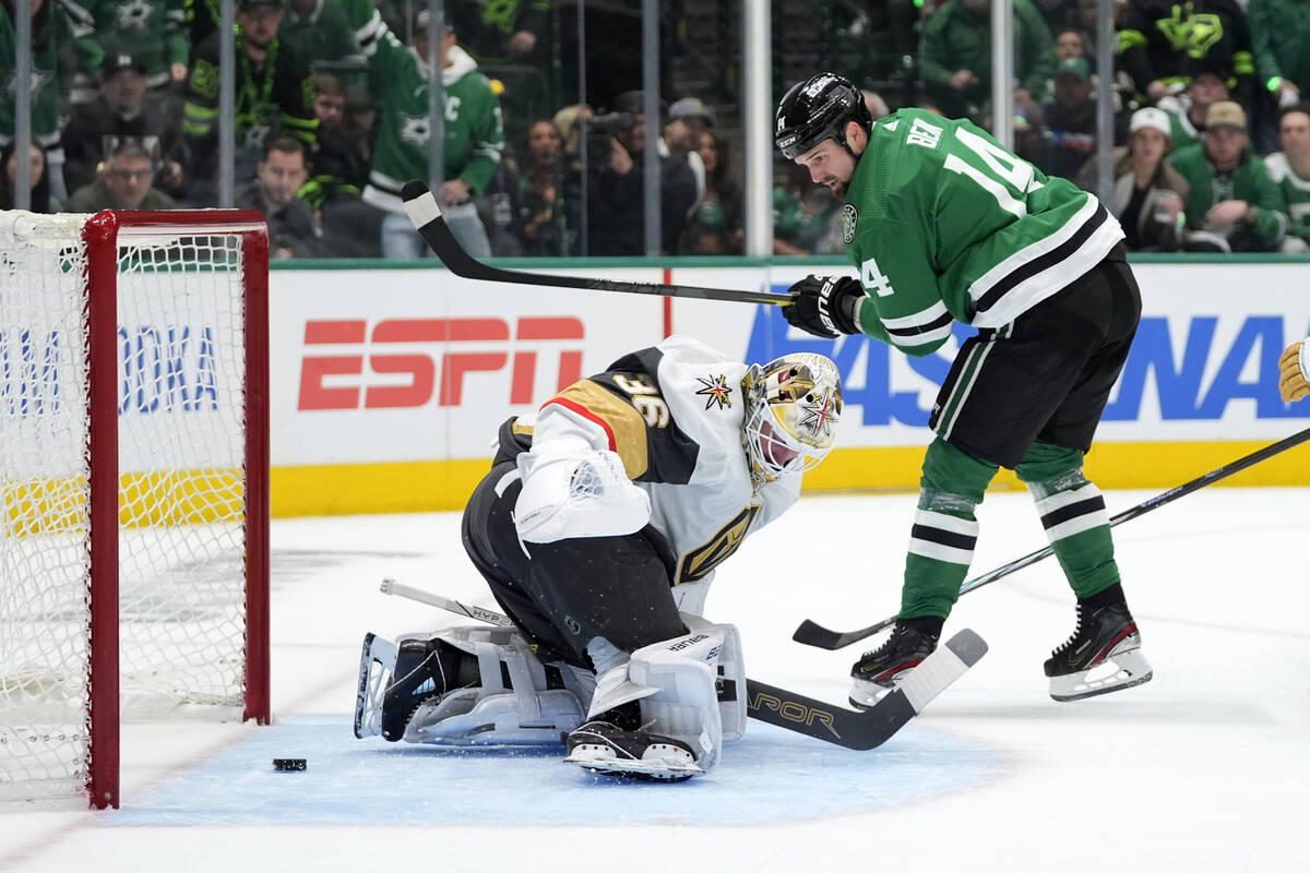 Dallas Stars left wing Jamie Benn (14) scores against Vegas Golden Knights goaltender Logan Tho ...