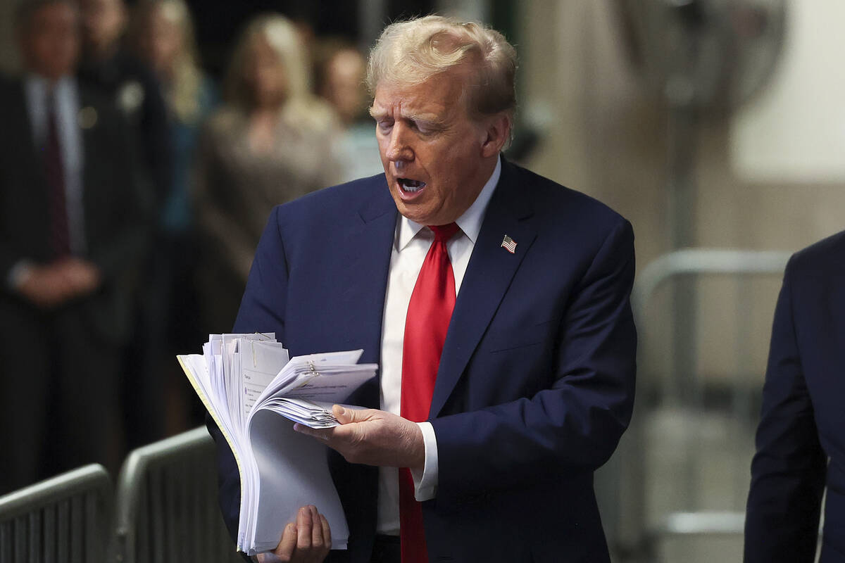 Former President Donald Trump speaks after leaving Manhattan criminal court, Tuesday, April 23, ...