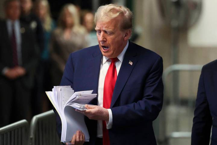 Former President Donald Trump speaks after leaving Manhattan criminal court, Tuesday, April 23, ...