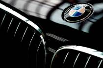 The logo of German car manufacturer BMW is pictured on a BMW 7 car prior to the earnings press ...
