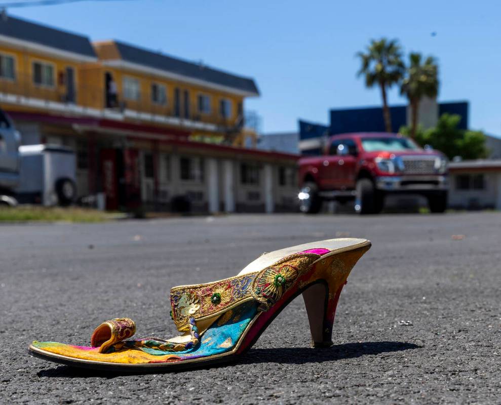 A high heeled shoe rests in the parking lot of the Gateway Motel which the Siegel Group recentl ...