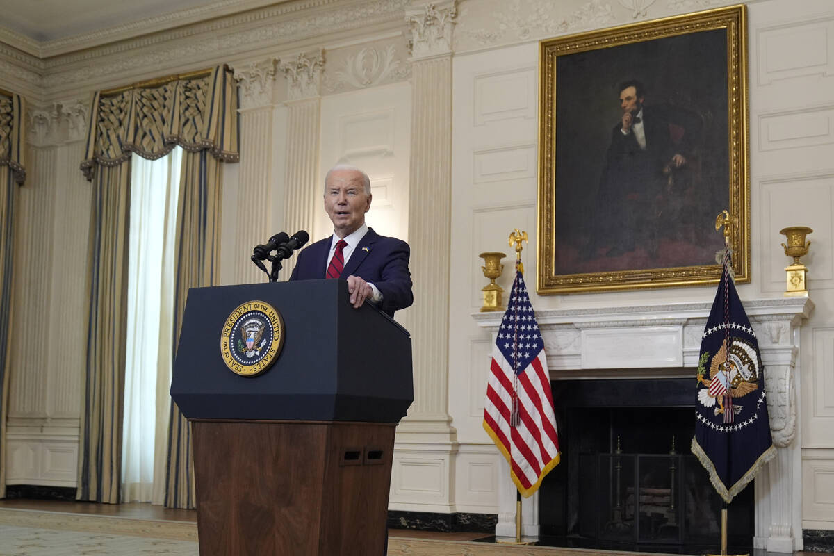 President Joe Biden speaks before signing a $95 billion Ukraine aid package that also includes ...