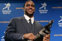 Heisman Trophy winner Reggie Bush of the University of Southern California smiles while posing ...