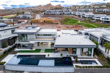 This Lake Las Vegas mansion was designed and built by Las Vegas Luxe Design/Build. The 6,653-sq ...