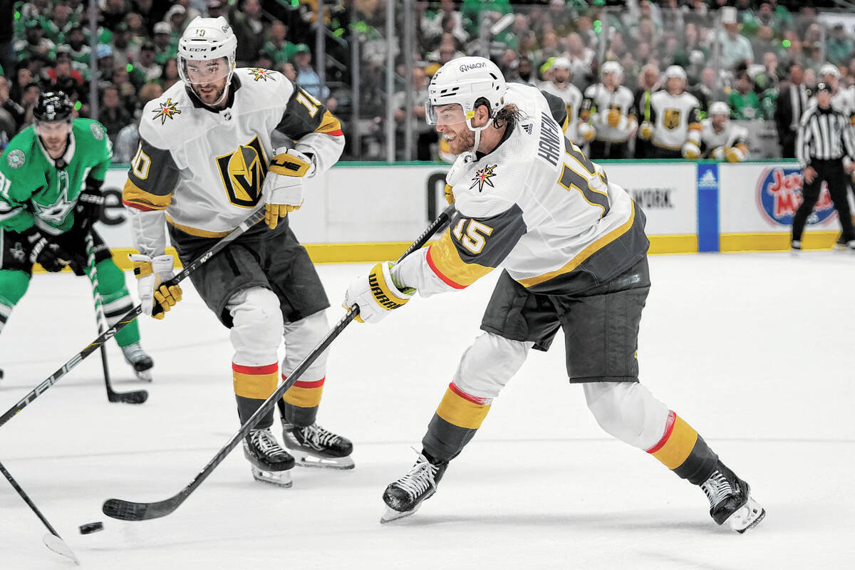 Vegas Golden Knights defenseman Noah Hanifin slaps a scoring shot against the Dallas Stars duri ...