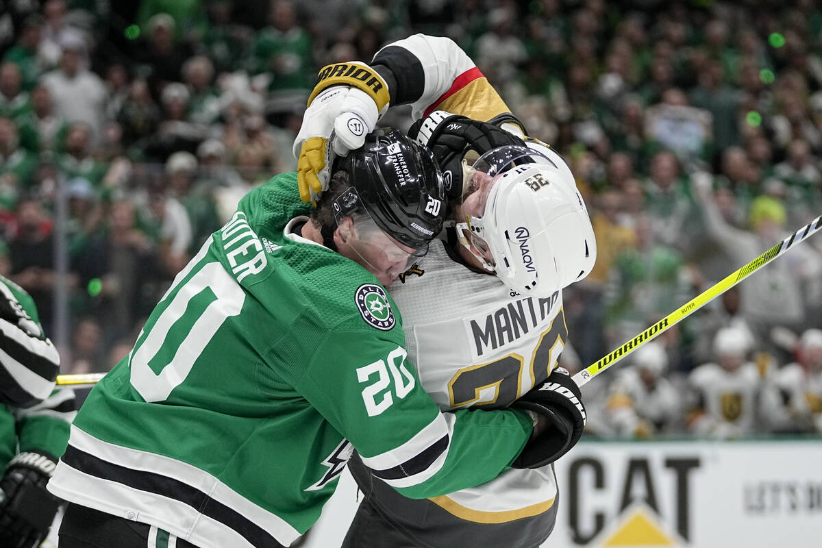 Dallas Stars defenseman Ryan Suter (20) and Vegas Golden Knights right wing Anthony Mantha (39) ...