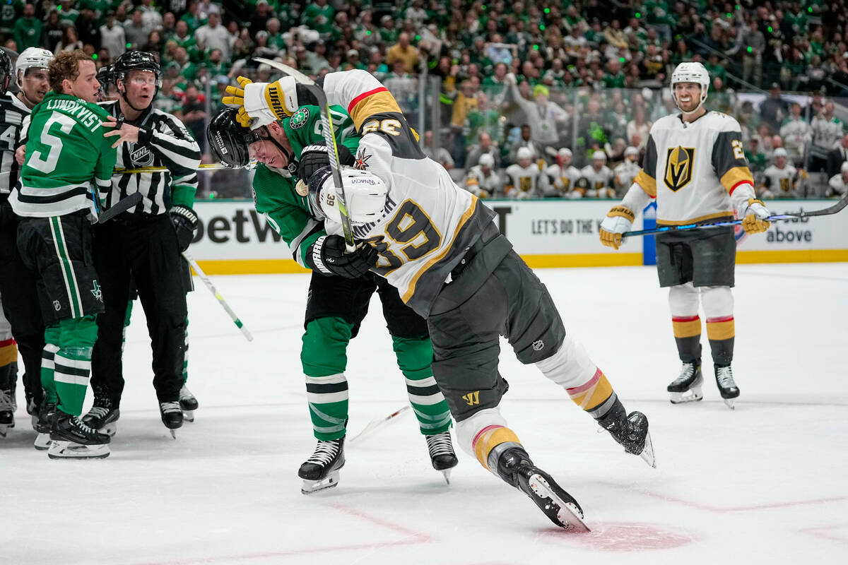 Dallas Stars defenseman Ryan Suter (20) and Vegas Golden Knights right wing Anthony Mantha (39) ...