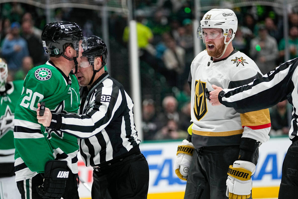 Dallas Stars defenseman Ryan Suter (20) and Vegas Golden Knights right wing Anthony Mantha (39) ...