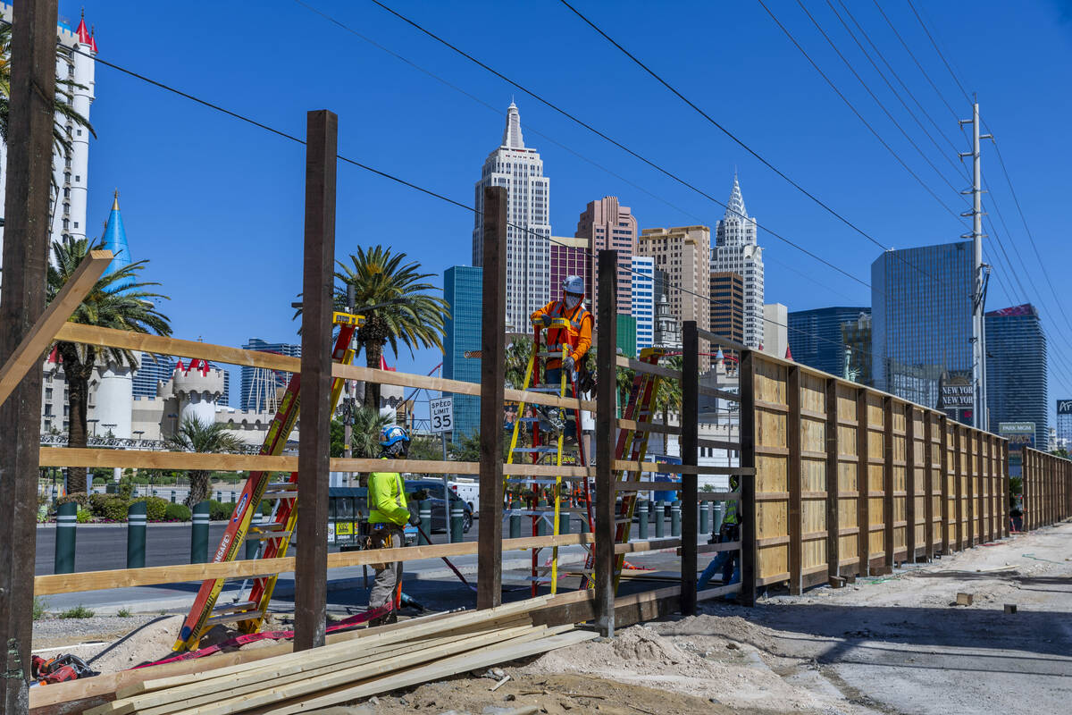 A work crew erects a large fence around the Tropicana Wednesday, April 24, 2024, in Las Vegas. ...