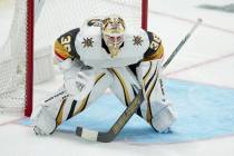 Vegas Golden Knights goaltender Logan Thompson defends his net against the Dallas Stars during ...