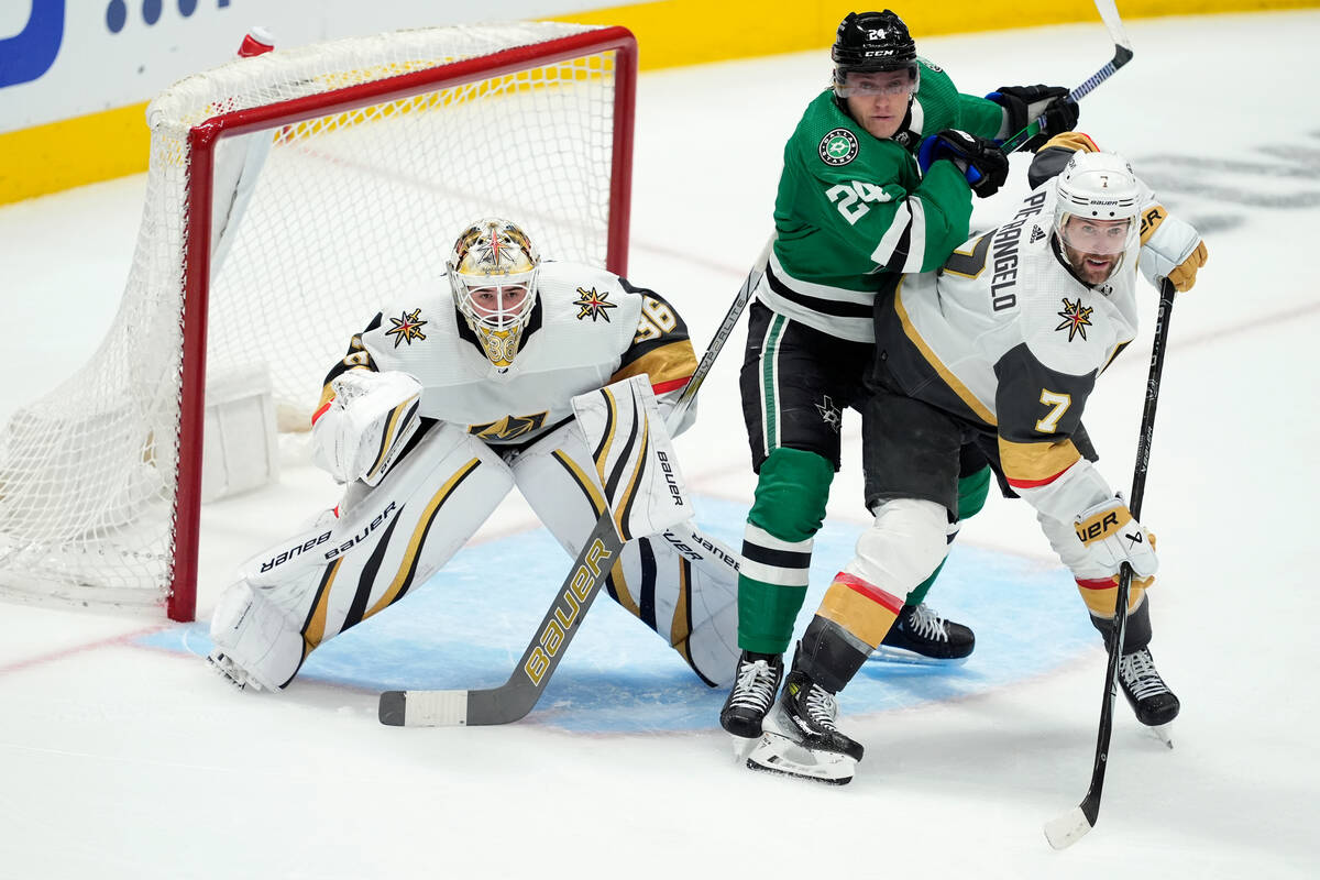 Vegas Golden Knights goaltender Logan Thompson and defenseman Alex Pietrangelo (7) defend again ...