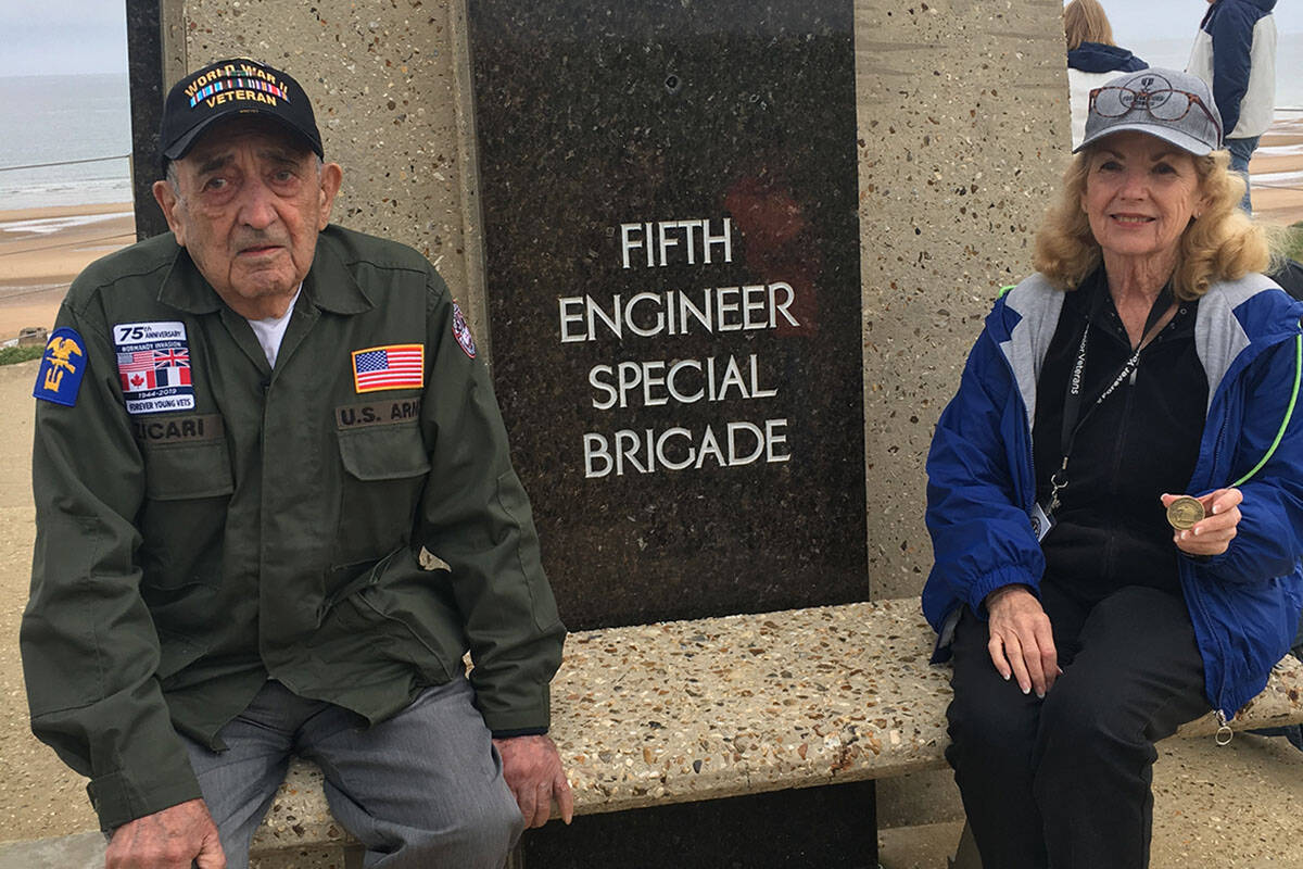 Onofrio "No-No" Zicari and his friend Diana Fazendin pose for a photo in front of the Fifth Eng ...