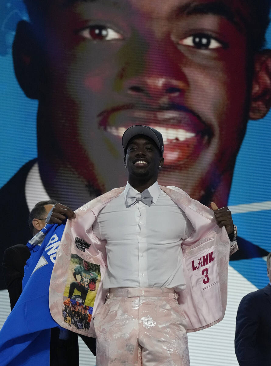 Alabama cornerback Terrion Arnold poses being chosen by the Detroit Lions with the 24th overall ...