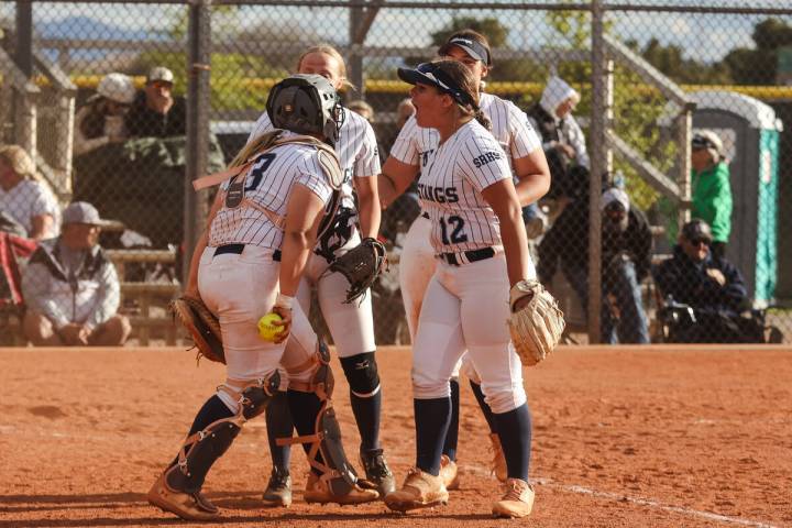 The Shadow Ridge High School softball team cheers during a game against Palo Verde High School ...