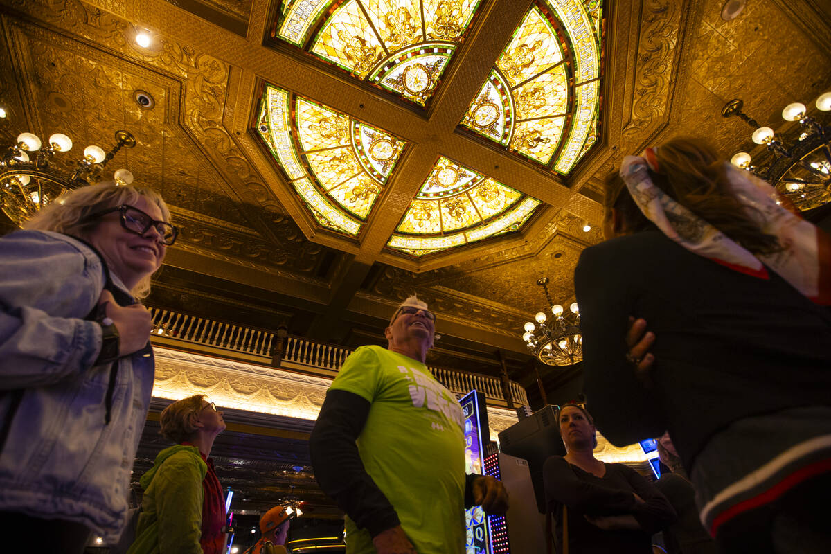 Richard Hooker, former Urban Arts Coordinator for the City of Las Vegas, center, leads a tour p ...