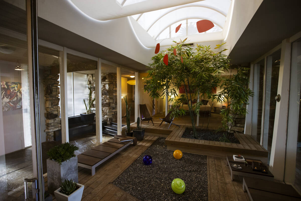 An atrium is seen inside a 1964 home in the historic John S. Park neighborhood during a tour of ...