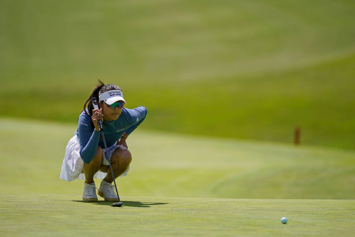 Alison Lee checks the fourth green before putting during the first round of the LPGA JM Eagle L ...
