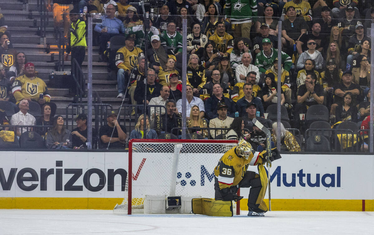 Golden Knights goaltender Logan Thompson (36) is dejected after being scored against by the Dal ...