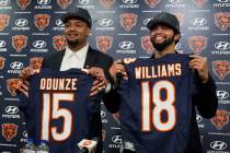 Chicago Bears No. 9 draft pick wide receiver Rome Odunze, left, and No. 1 draft pick quarterbac ...