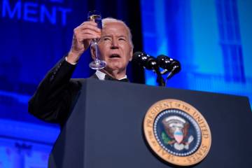 President Joe Biden makes a toast to a free press at the White House Correspondents' Associatio ...
