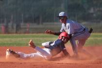 Liberty outfielder Rashaan Chavis (34) steals second base against Spring Valley's Royce Ogawa ( ...