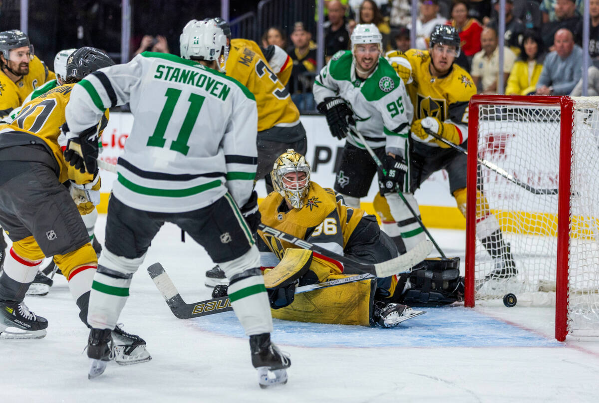 Golden Knights goaltender Logan Thompson (36) watches a shot score by the Dallas Stars during t ...