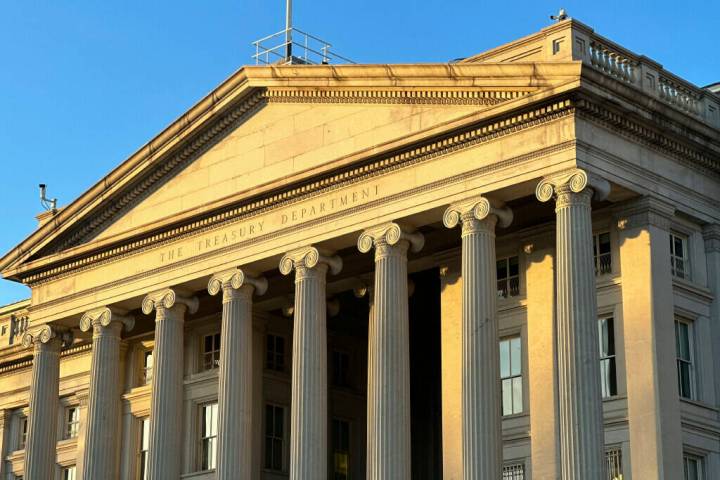 The Treasury Department is seen near sunset in Washington, Wednesday, Jan. 18, 2023. (AP Photo/ ...
