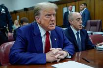 Former President Donald Trump awaits the start of proceedings at Manhattan criminal court, Tues ...