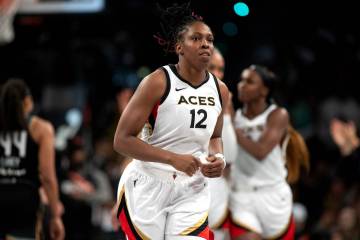 Las Vegas Aces guard Chelsea Gray (12) runs toward the bench during the second half in Game 3 o ...